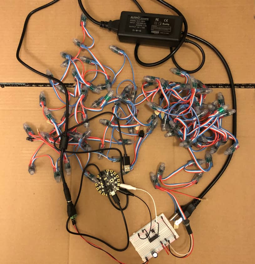 Stellar: My Teammate Angela Xu Used Neopixel Strands for the Lights, Mounted Onto a Cardboard Base, LEDs were Connected to a CPX MicroController and Coded Using MakeCode